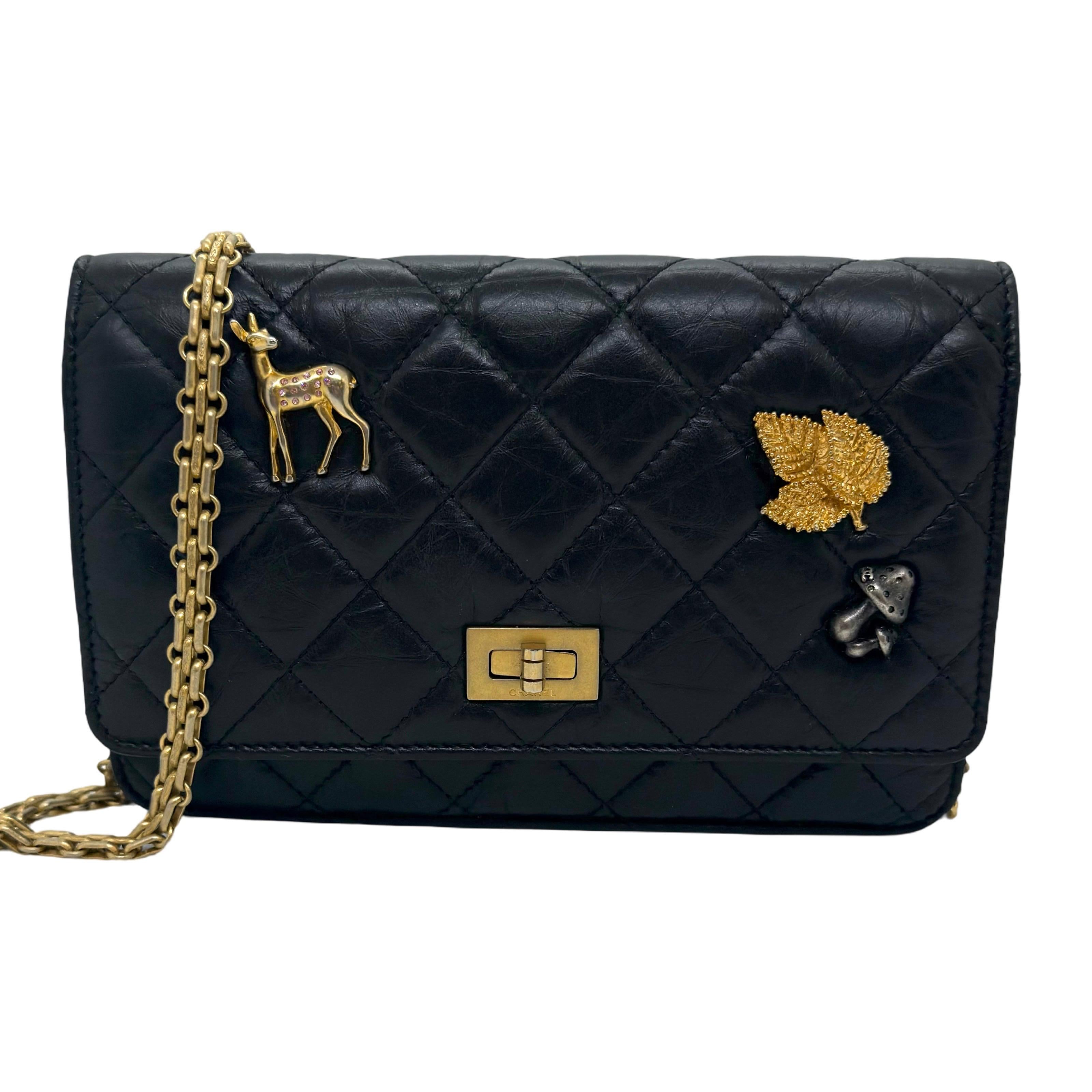 Chanel Aged Calfskin Quilted Lucky Charms 2.55 Reissue Wallet On Chain in black with aged gold hardware