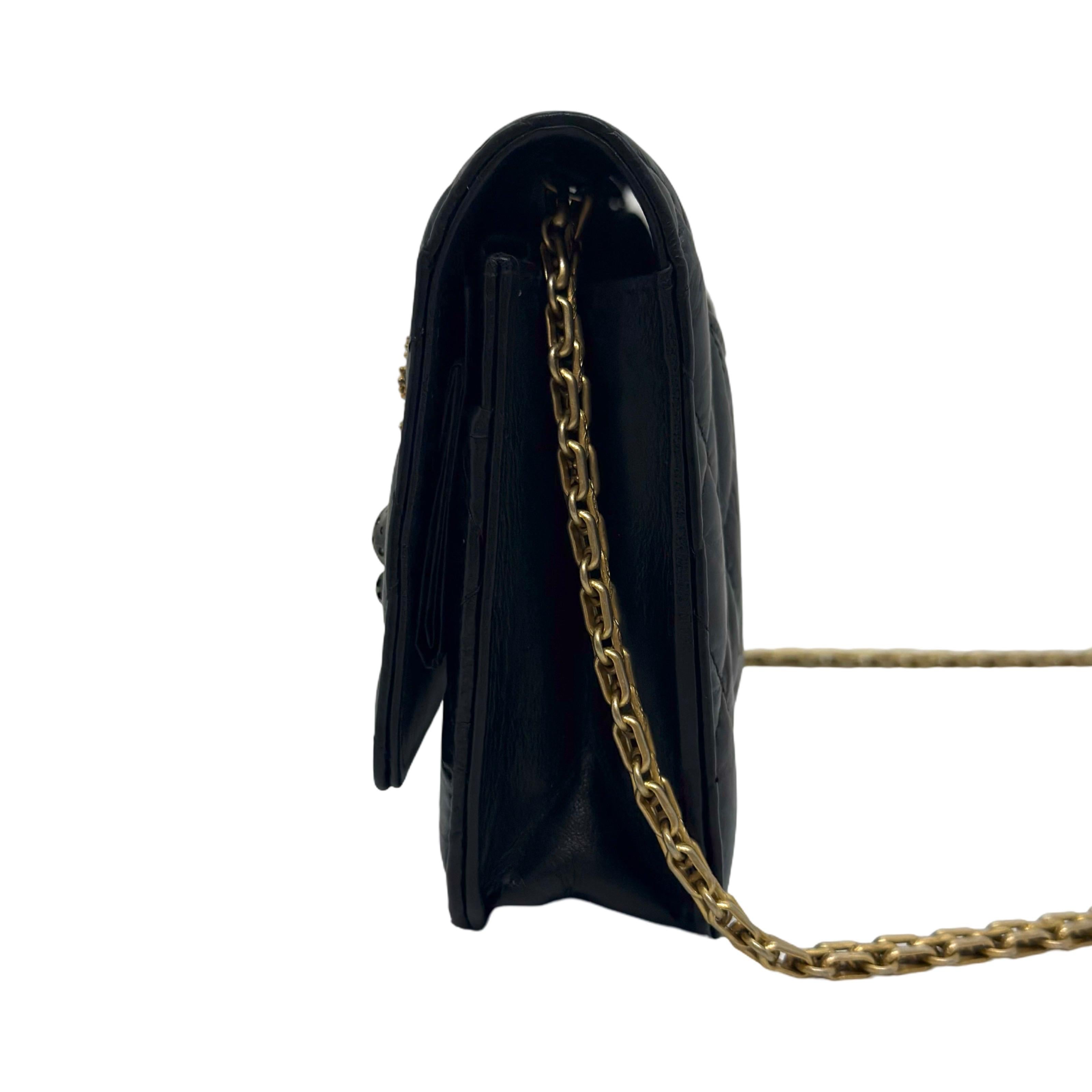 Chanel Aged Calfskin Quilted Lucky Charms 2.55 Reissue Wallet On Chain in black with aged gold hardware