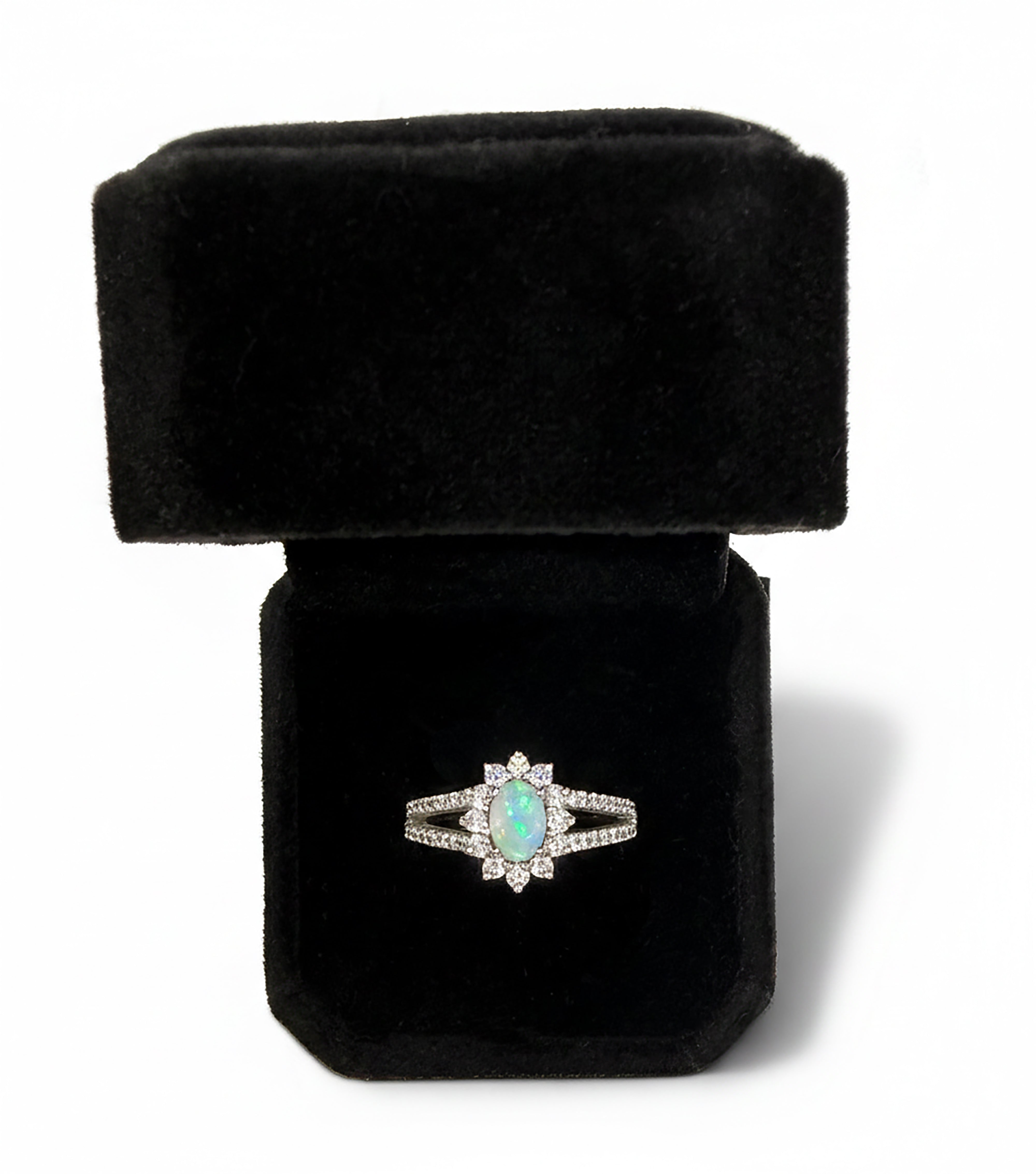 9KT White Gold split shank halo design ring