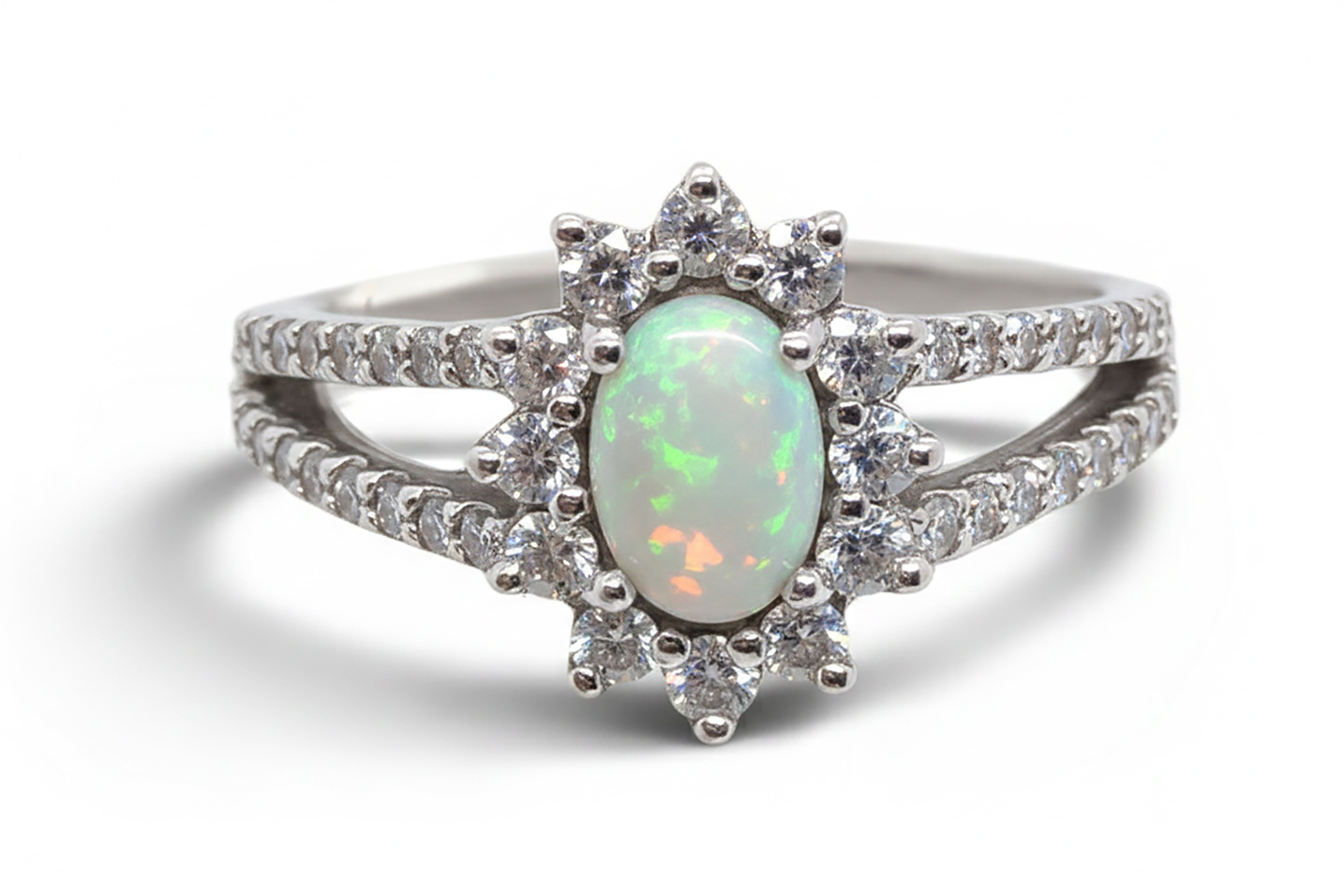 9KT White Gold split shank halo design ring