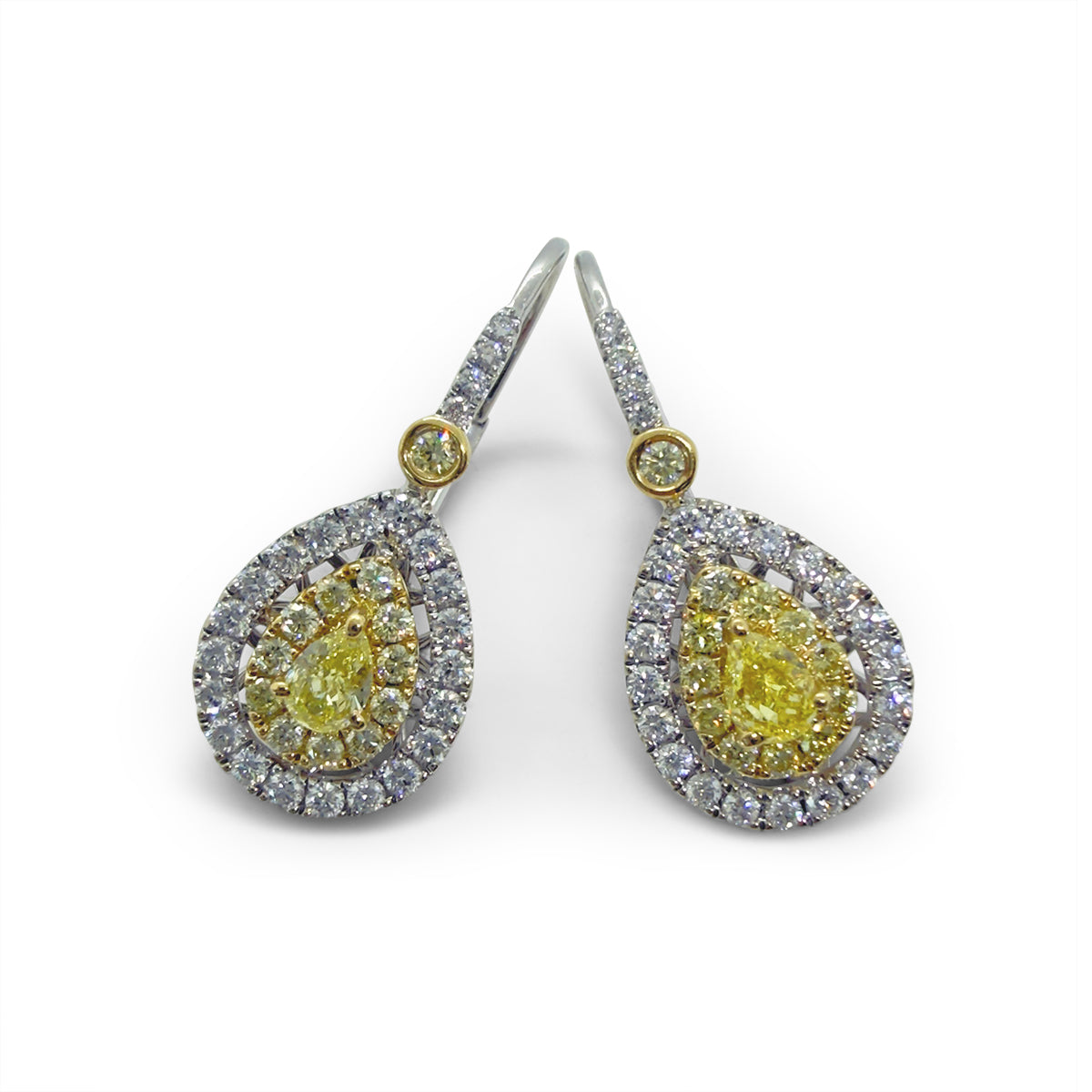 18KT White Gold Earrings: 2 x 0.40ct vivid fancy yellow natural diamonds